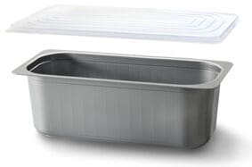 A rectangular stainless steel food pan with a reflective surface and smooth edges is topped with an Alcas Take Out Container Lid for Gelato Tubs from a 150-piece case, featuring a secure fit for safe storage and transport due to its ridged, transparent plastic design.