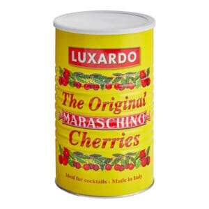 A yellow can of Luxardo Maraschino Cherries (4x5.6Kg case) features bold red text with cherry illustrations and proclaims, "Ideal for cocktails - Made in Italy.