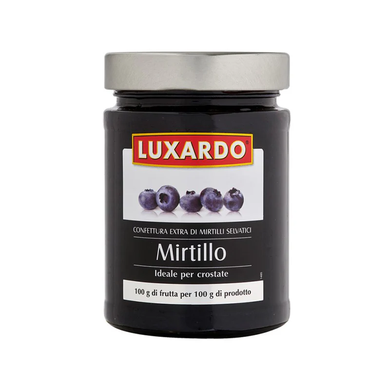 The Luxardo Premium Blueberry Jams and Spreads 'Mirtillo' (4x5.4Li) features a jar with blueberry images and Italian text, ideal for tarts. It comes with a silver lid, dark-hued jam, and combines tradition with delightful flavor.