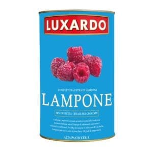 A tin of Luxardo Raspberry Jam (4x5.4Li) features a vibrant raspberry image on the label. With 80% fruit content, this extra jam is ideal for tarts. The blue and white text against the red and yellow background enhances its appeal.