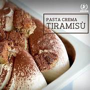 Close-up of creamy tiramisu dessert in a white dish, dusted with cocoa. Text overlay reads "Pasta Crema Tiramisù" top right, highlighting rich Elenka (443) Tiramisu Gelato Paste (2x6Kg case) for authentic flavor.