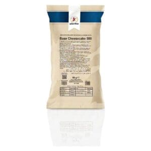 A beige and blue packet labeled “Elenka (1059) Quick Base Cheesecake (10x1.5Kg case)” stands upright, displaying ingredients and nutritional info in several languages, reflected on a white surface.