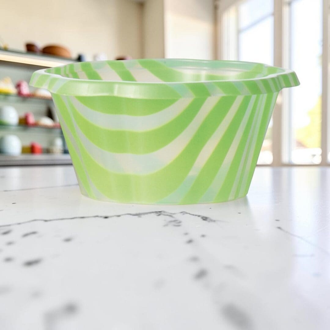 Alcas Coppa Joy green striped gelato cup 130cc on marble gelateria counter