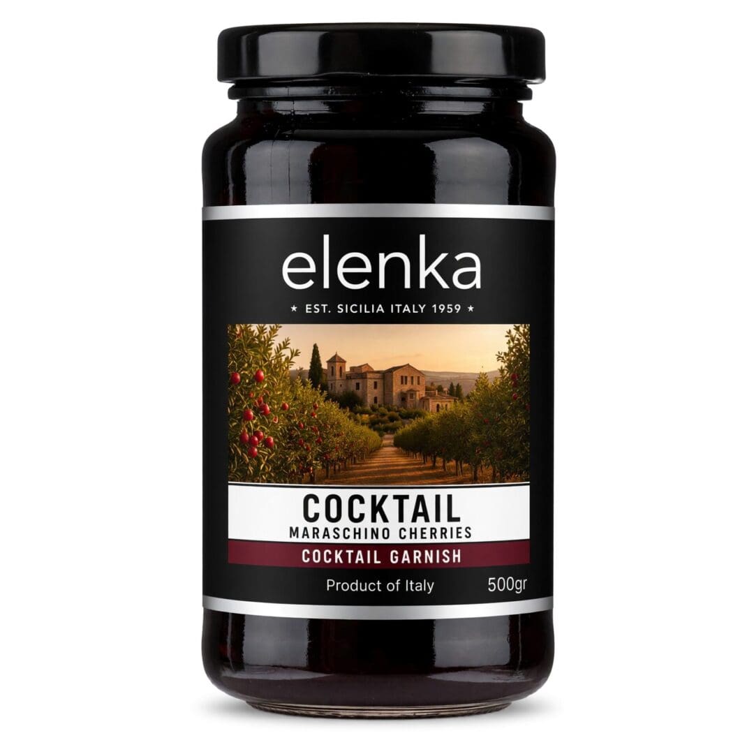A jar of Elenka brand cocktail maraschino cherries, 500g, with a label showing an Italian landscape. The label reads “Cocktail Maraschino Cherries, Cocktail Garnish, Product of Italy.”.